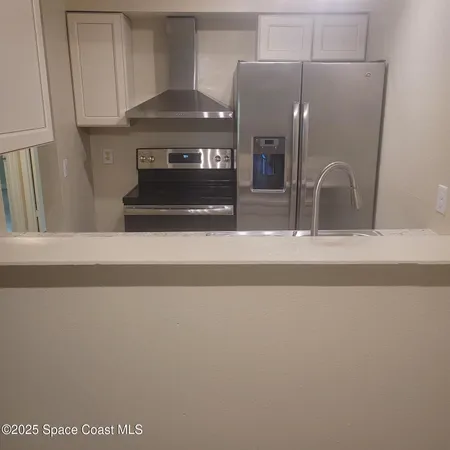 a view of fireplace and bathroom