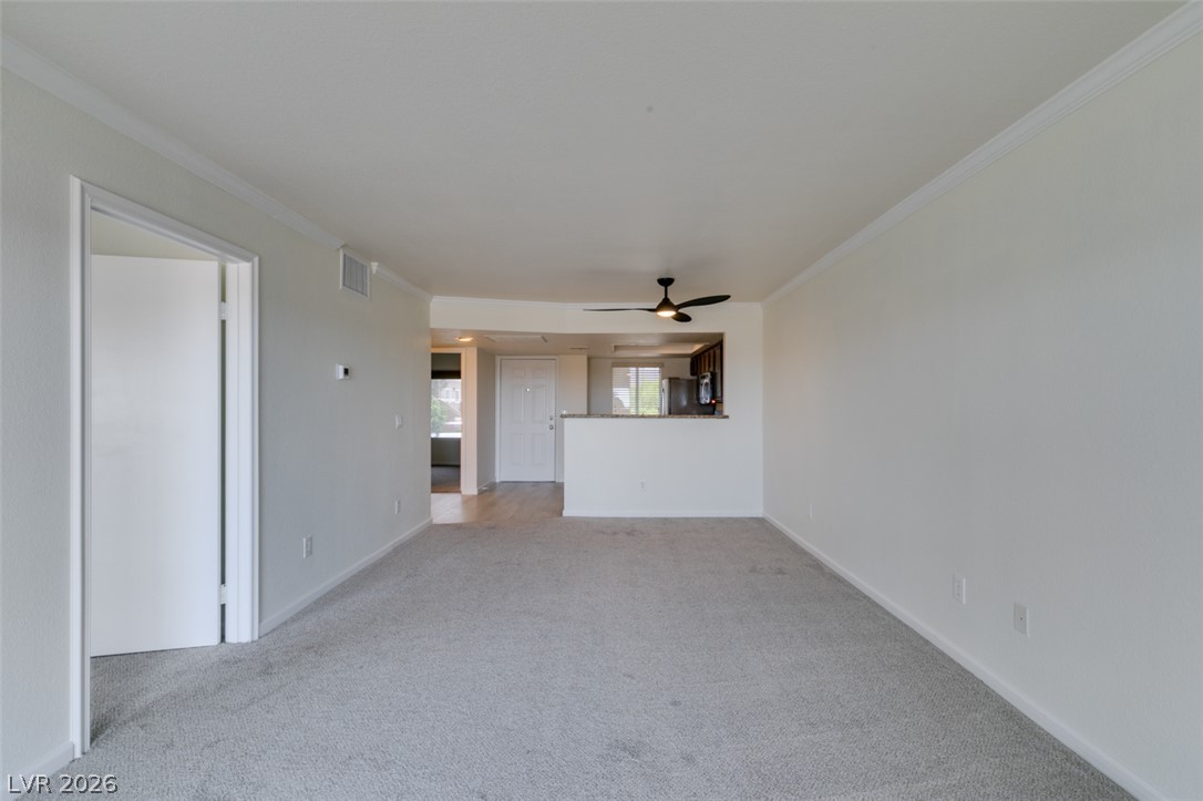 8070 West Russell Road, Unit 2026 Las Vegas, NV 89113 - Photo 22 of 41 A spacious common area offers an open layout, ideal for modern living.