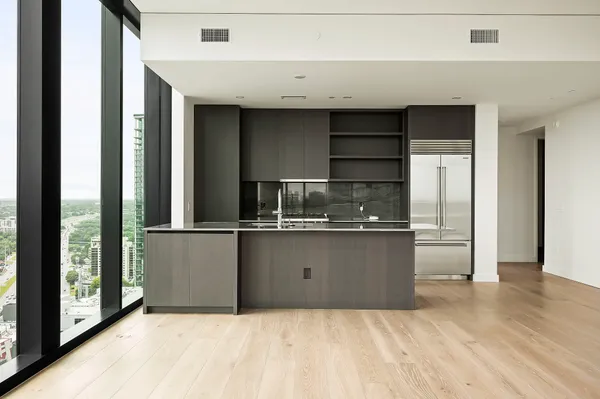 a view of workspace with large windows