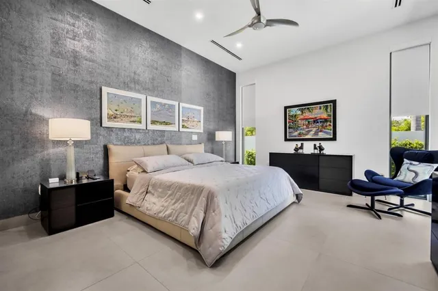 a bathroom with a sink a mirror and a shower