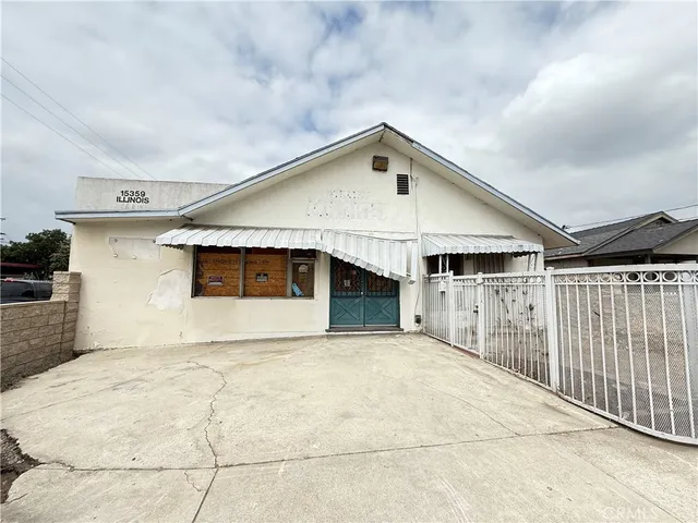 a front view of a house with garage