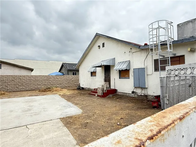 a view of a house with a patio