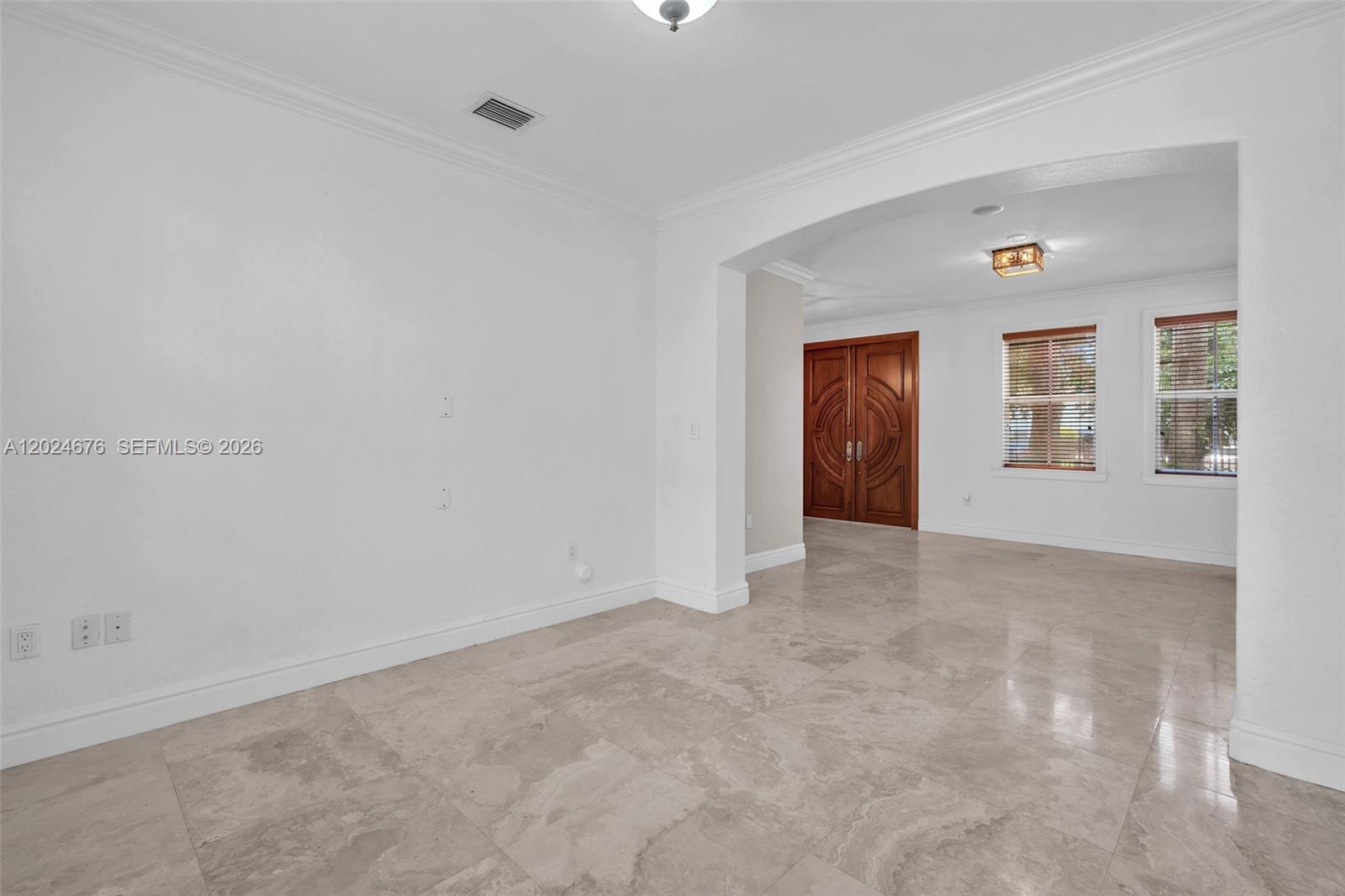 2155 Southwest 156th Court Miami, FL 33185 - Photo 17 of 57 a view of an empty room with a window