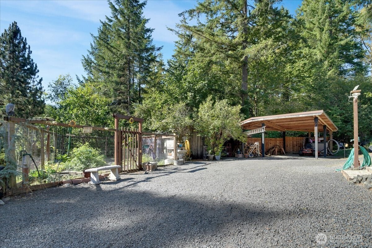 269 Logan Hill Road Chehalis, WA 98532 - Photo 27 of 40 a view of a house with a outdoor space and sitting area