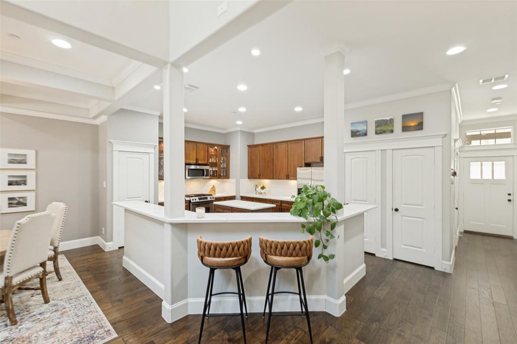 1600 Abrams Road, Unit 27 Dallas, TX 75214 - Photo 9 of 27 Kitchen with quartz countertops and floor to ceiling cabinetry