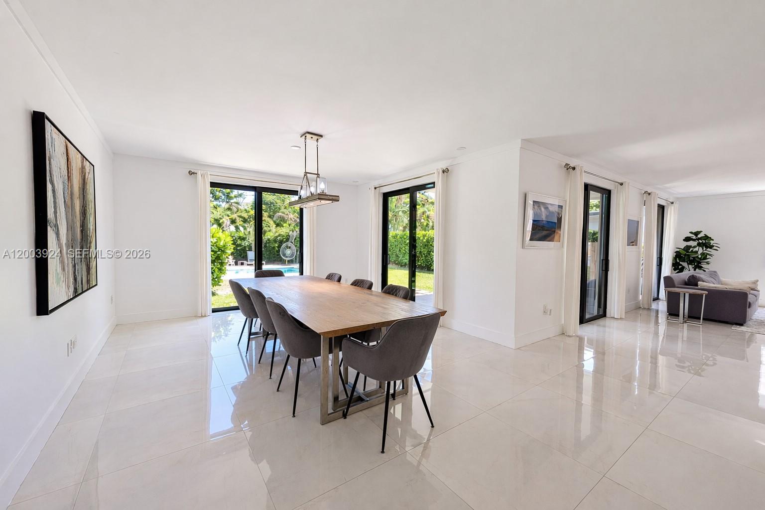 471 Southwest 30th Road Miami, FL 33129 - Photo 12 of 39 a view of a dining room with furniture and window