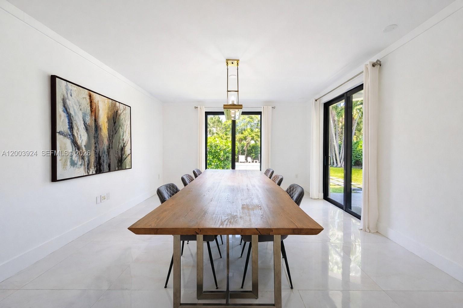 471 Southwest 30th Road Miami, FL 33129 - Photo 14 of 39 a view of a dining room with furniture window and outside view