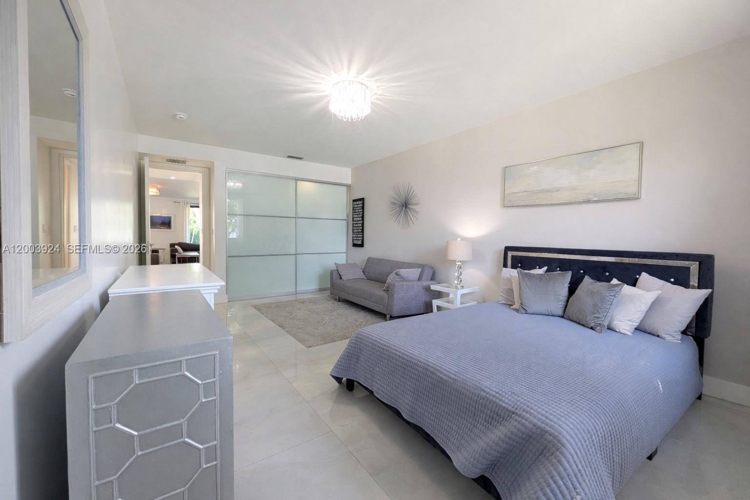 471 Southwest 30th Road Miami, FL 33129 - Photo 16 of 39 a bedroom with double bed and a window