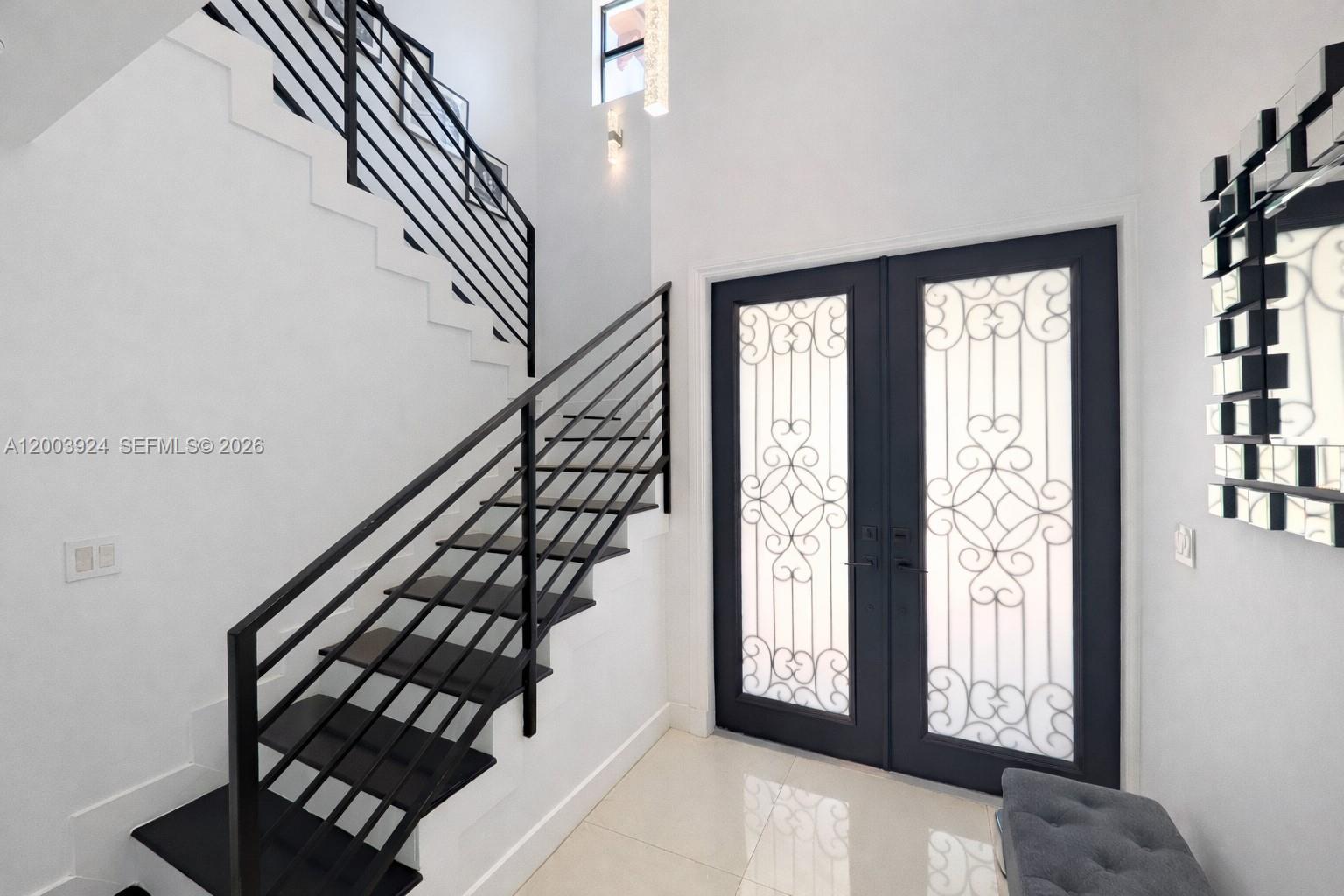471 Southwest 30th Road Miami, FL 33129 - Photo 18 of 39 a view of an entryway with staircase