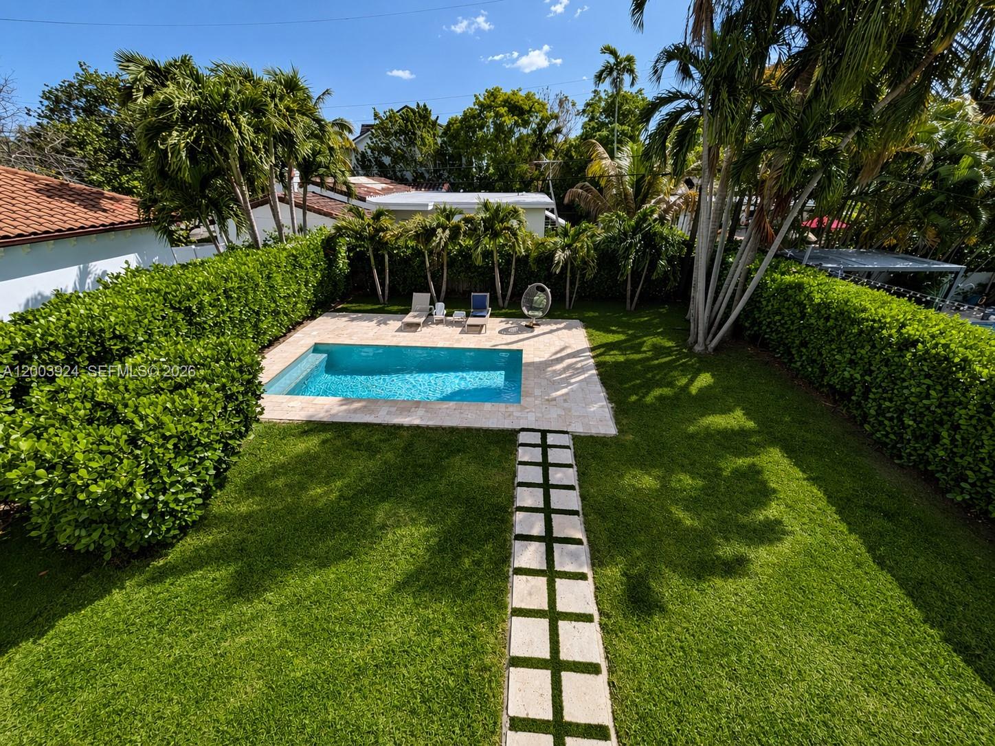 471 Southwest 30th Road Miami, FL 33129 - Photo 25 of 39 a view of a garden with a slide
