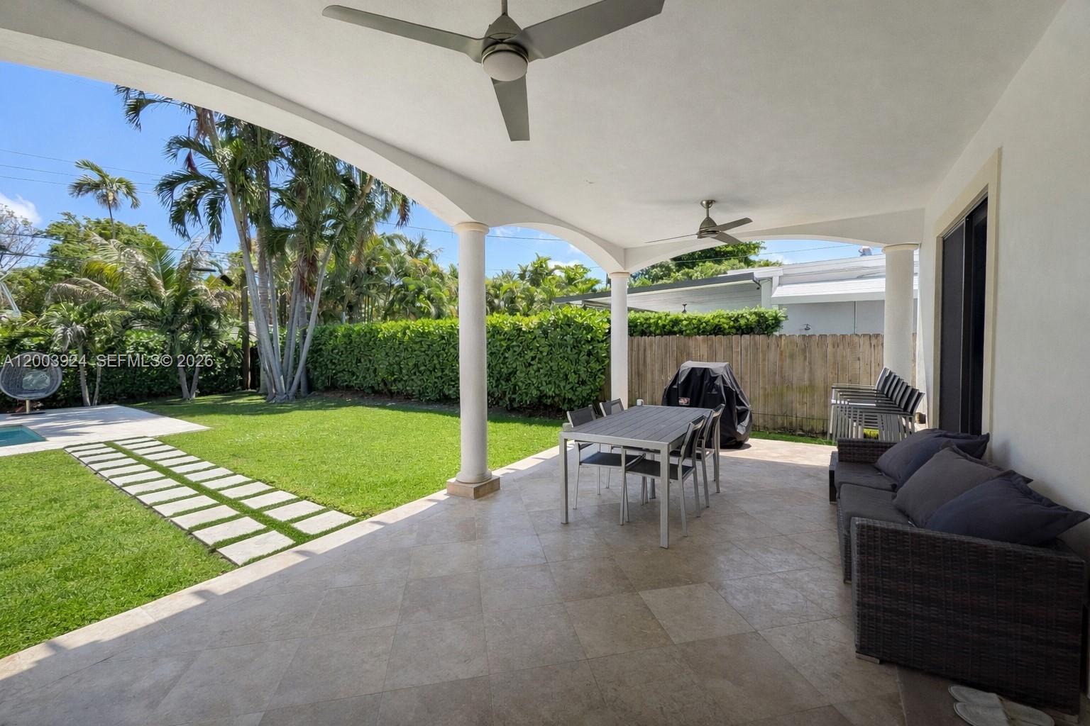 471 Southwest 30th Road Miami, FL 33129 - Photo 35 of 39 a sitting area with furniture and garden view