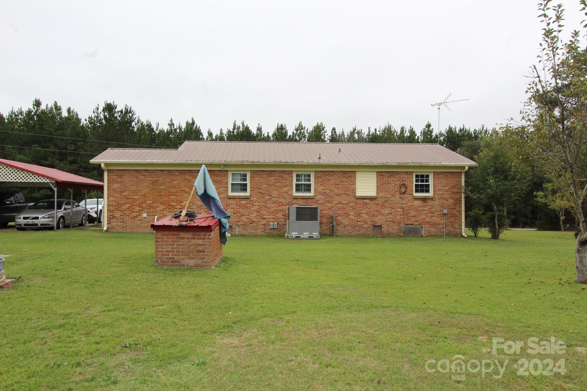 188 Land Of Promise Road Chesterfield, SC 29709 - Photo 6 of 27 a front view of house with yard and trees
