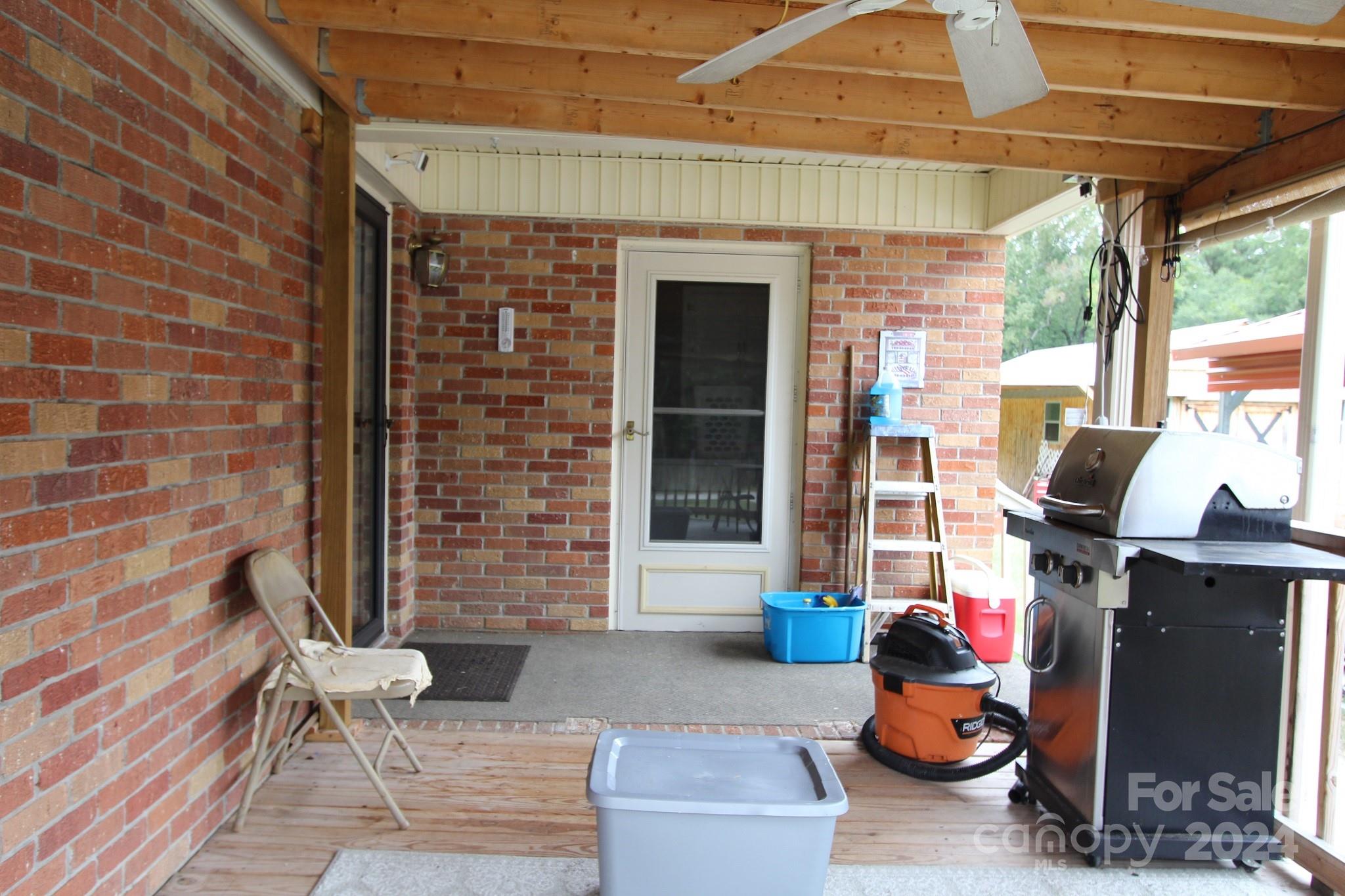 188 Land Of Promise Road Chesterfield, SC 29709 - Photo 9 of 27 a backyard of a house with outdoor seating