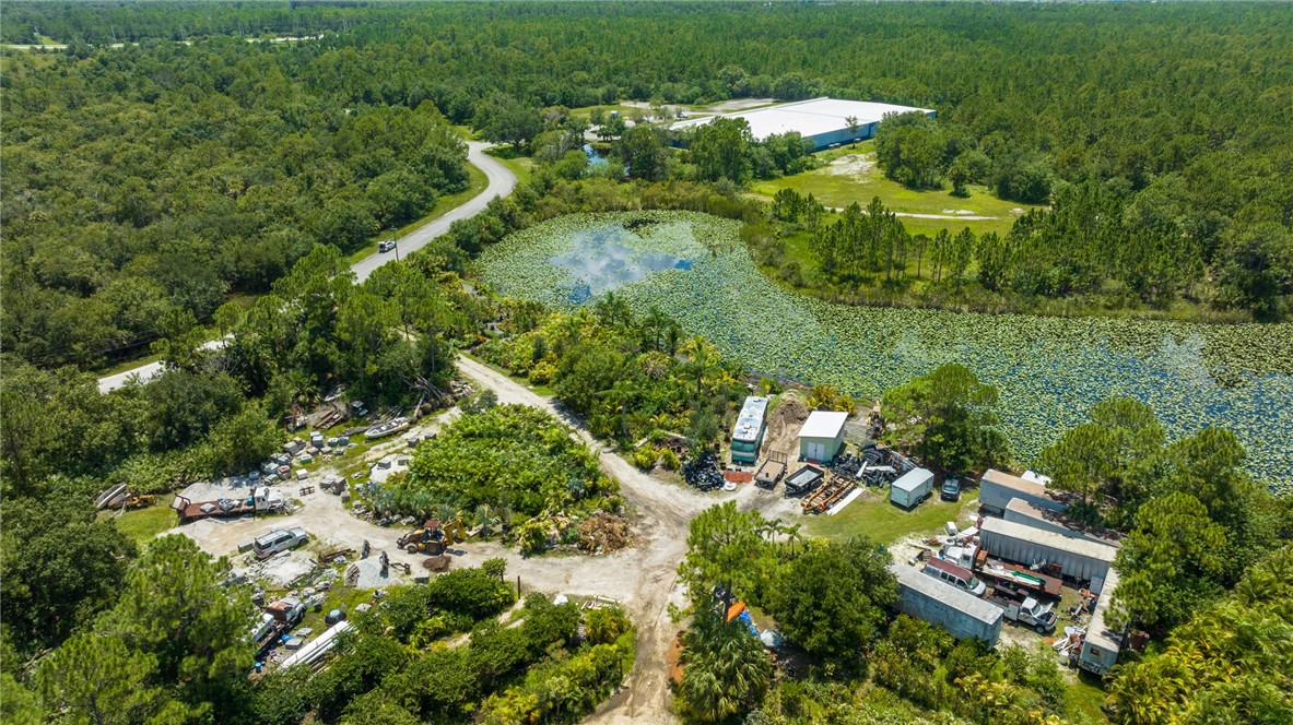 10255 99th Way Sebastian, FL 32958 - Photo 13 of 20 an aerial view of residential houses with outdoor space and trees