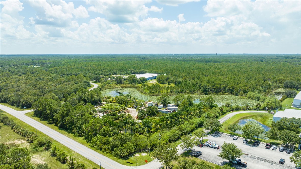 10255 99th Way Sebastian, FL 32958 - Photo 14 of 20 a view of a green field with lots of bushes