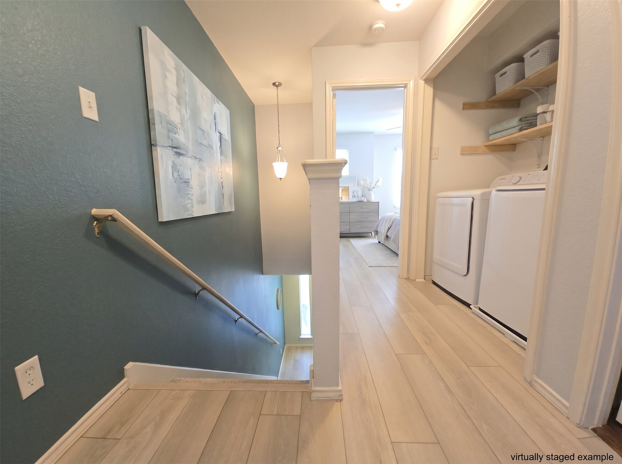 815 Bogart Road Cedar Park, TX 78613 - Photo 8 of 14 Conveniently located laundry area with ample storage, steps from the primary suite.