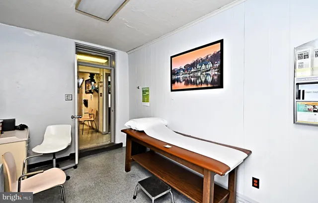 a room with furniture and wooden floor