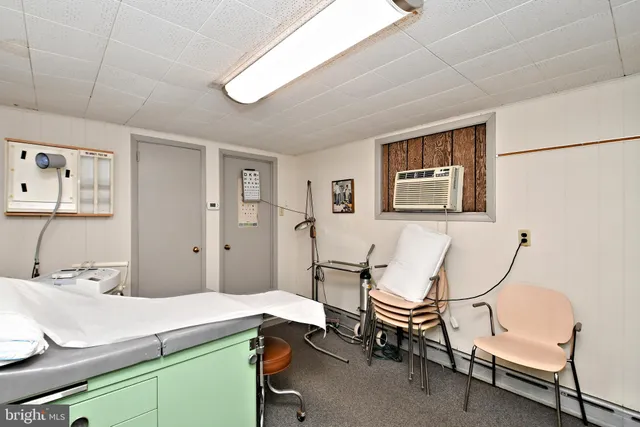 a room with furniture or couch and a book shelf