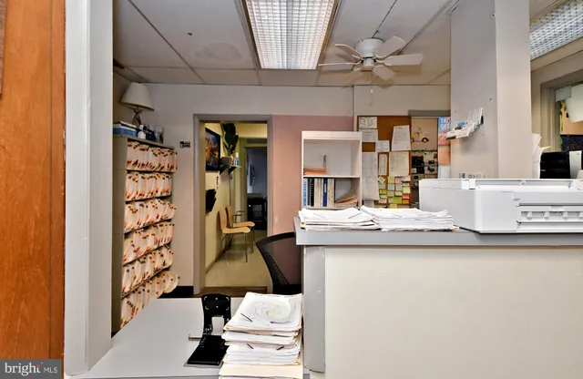 a workspace with furniture and window