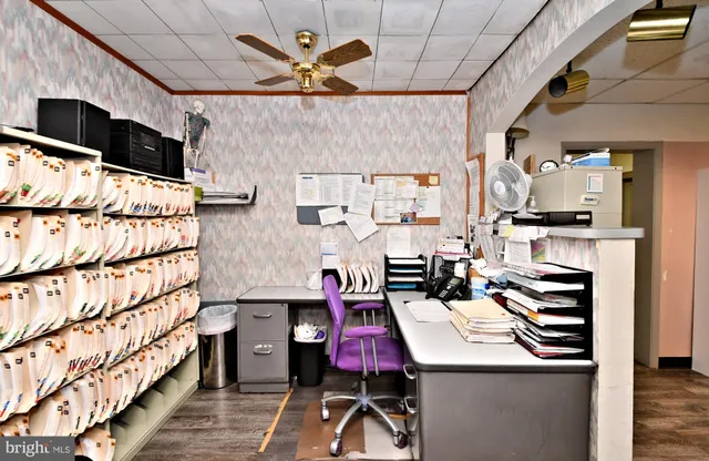 a view of entryway with wooden floor