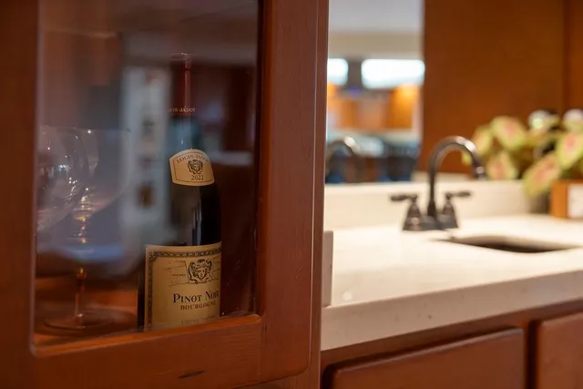 a kitchen with stainless steel appliances granite countertop a stove top oven a sink with granite countertops and cabinets