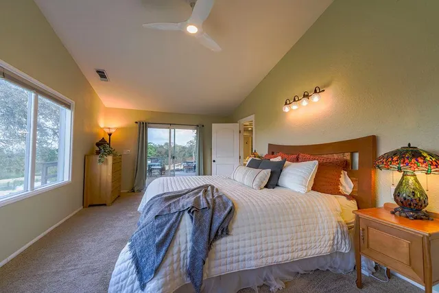 a spacious bathroom with a double vanity sink mirror and double