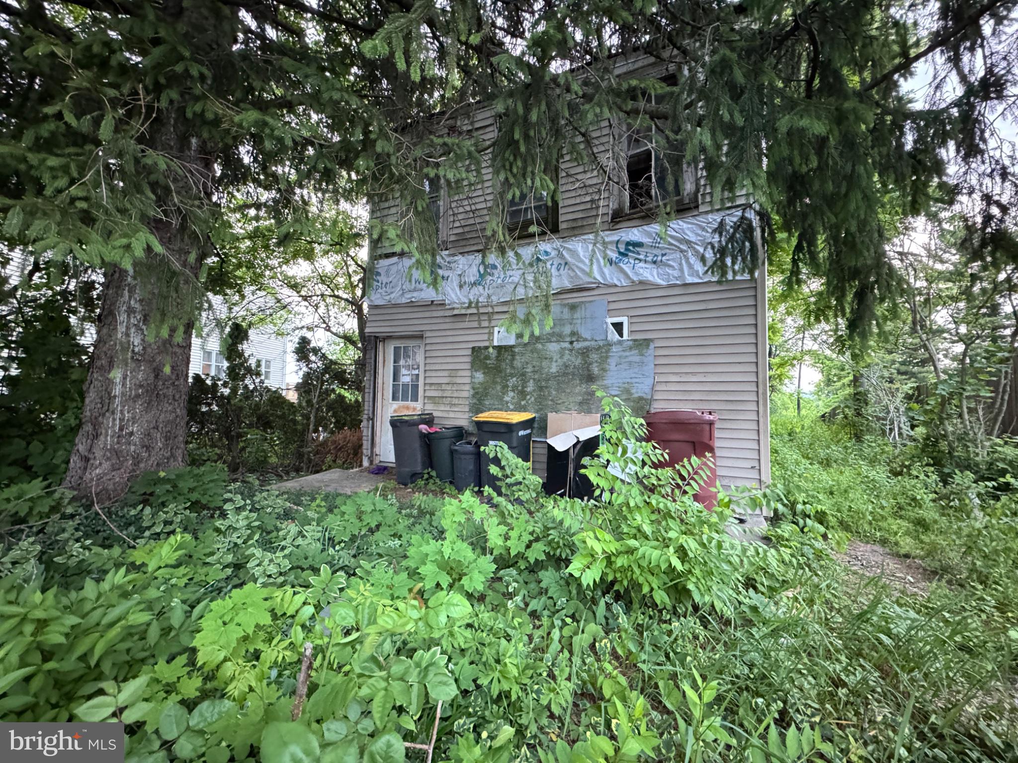 1007 Catasauqua Road Whitehall, PA 18052 - Photo 1 of 1 Overgrown charm meets rustic decay.