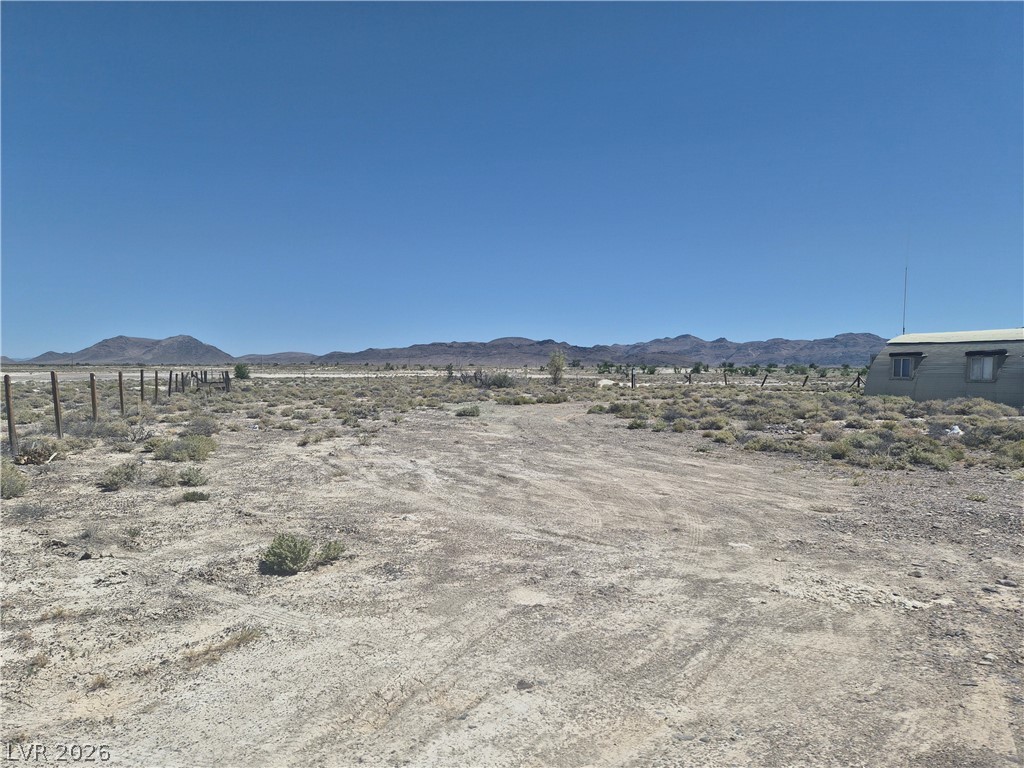 11545 South Spring Meadows Road Pahrump, NV 89060 - Photo 5 of 33 This spacious desert lot offers expansive mountain views and abundant natural light.