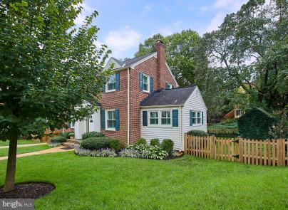 4624 19th Road North Arlington, VA 22207 - Photo 2 of 22 a front view of a house with a yard