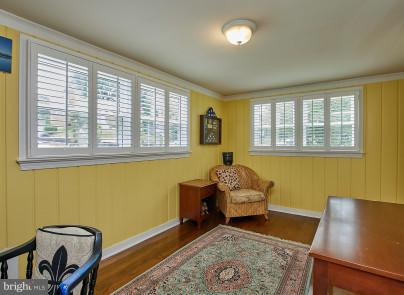 4624 19th Road North Arlington, VA 22207 - Photo 10 of 22 a living room with furniture and a window