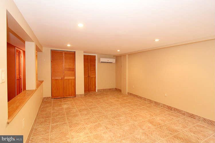 1414 A Street Northeast Washington, DC 20002 - Photo 20 of 27 Basement with Tiled Floor & Closet w/Stretchers