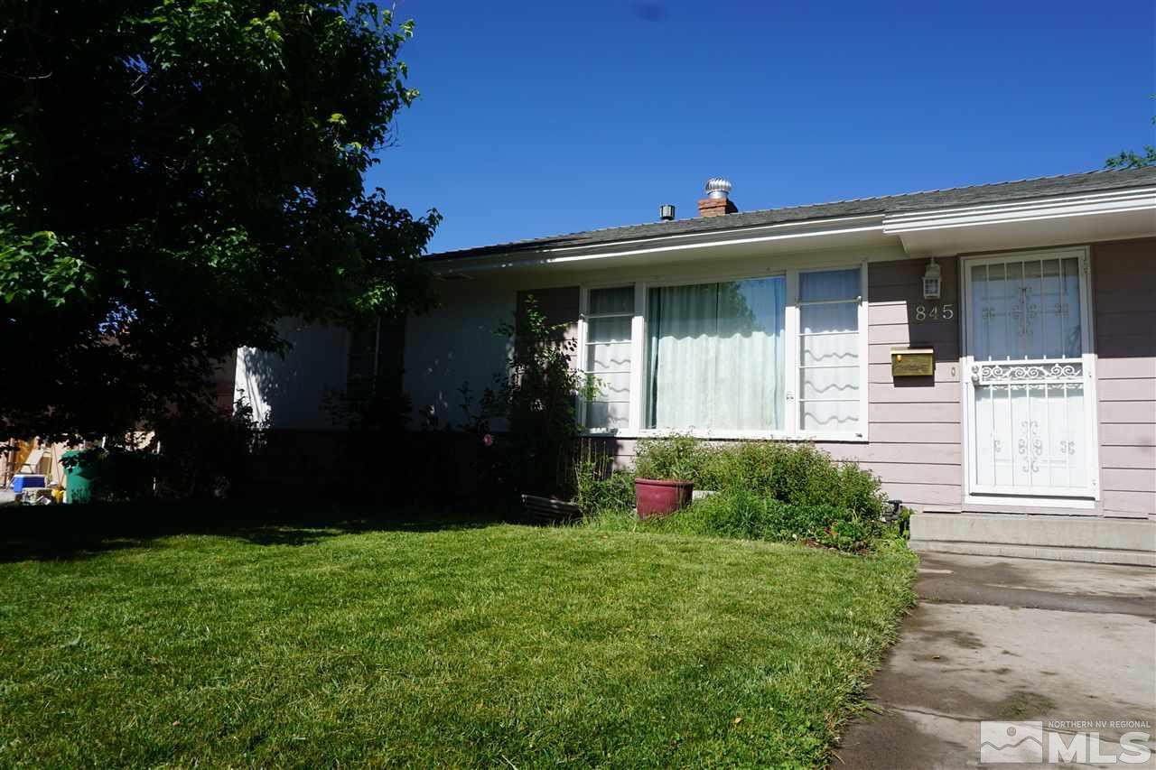 845 Bates Avenue Reno, NV 89502 - Photo 1 of 18 front view of a house with a yard