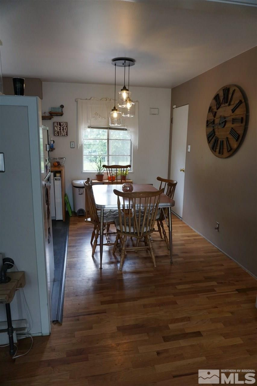 845 Bates Avenue Reno, NV 89502 - Photo 12 of 18 a view of a dining room with furniture window and wooden floor