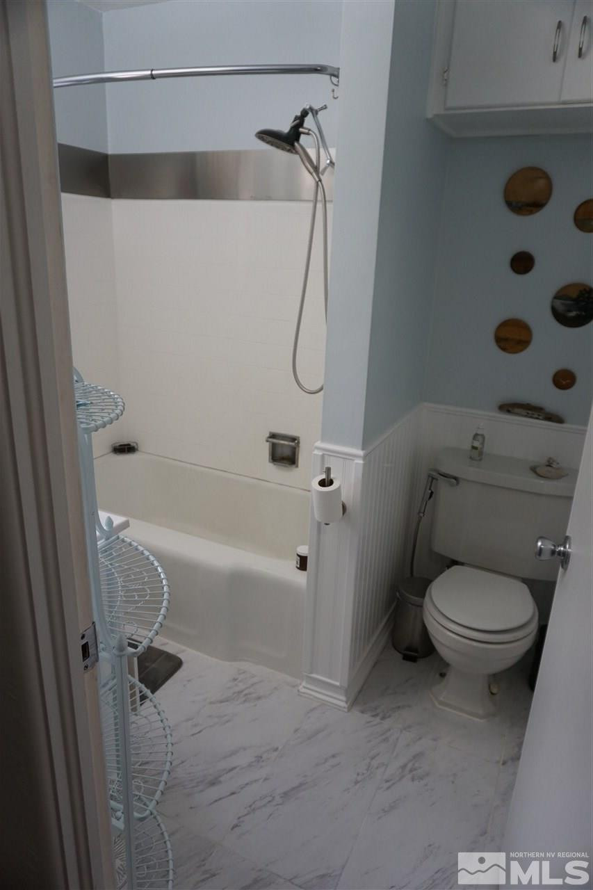 845 Bates Avenue Reno, NV 89502 - Photo 17 of 18 a bathroom with a toilet and a shower