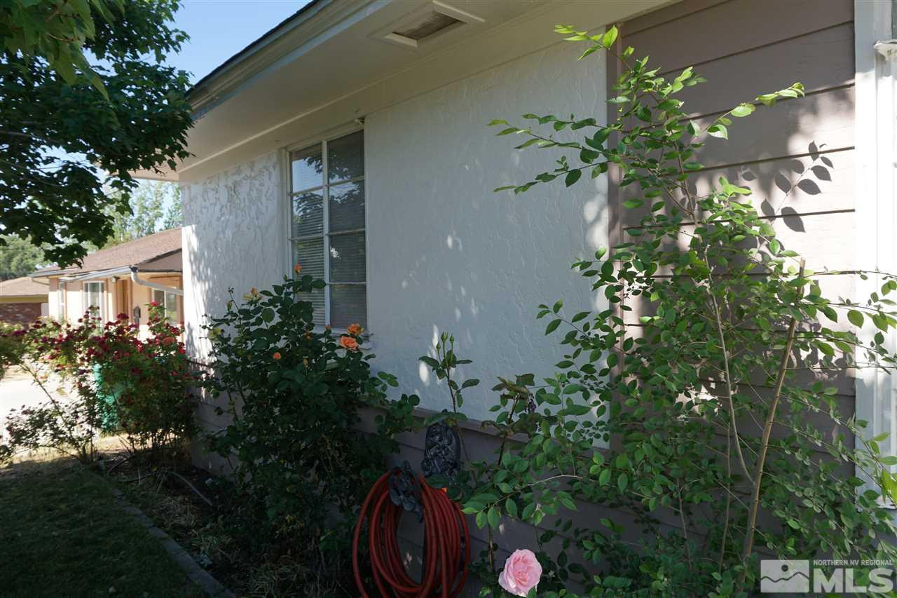 845 Bates Avenue Reno, NV 89502 - Photo 2 of 18 a backyard of a house with lots of green space