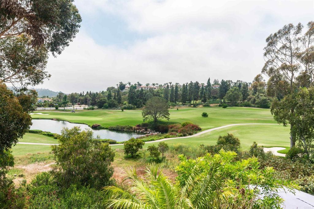 6817 Adolphia Drive Carlsbad, CA 92011 - Photo 21 of 34 a view of a golf course with a lake
