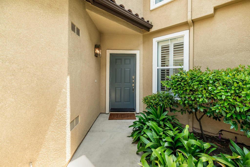 6817 Adolphia Drive Carlsbad, CA 92011 - Photo 4 of 34 front view of a house with a yard
