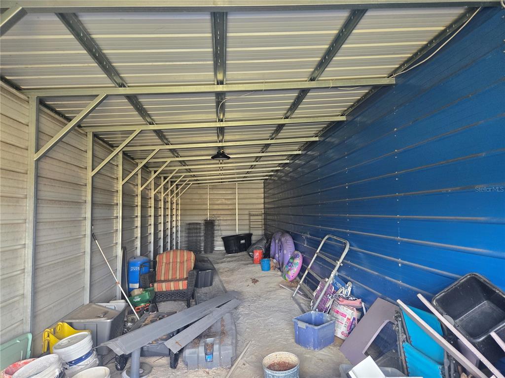 1981 Southeast Piggy Back Road Arcadia, FL 34266 - Photo 16 of 19 a backyard of a house with seating space