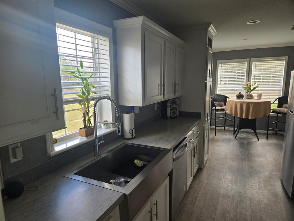 1981 Southeast Piggy Back Road Arcadia, FL 34266 - Photo 7 of 19 a kitchen with a stove a sink and a refrigerator