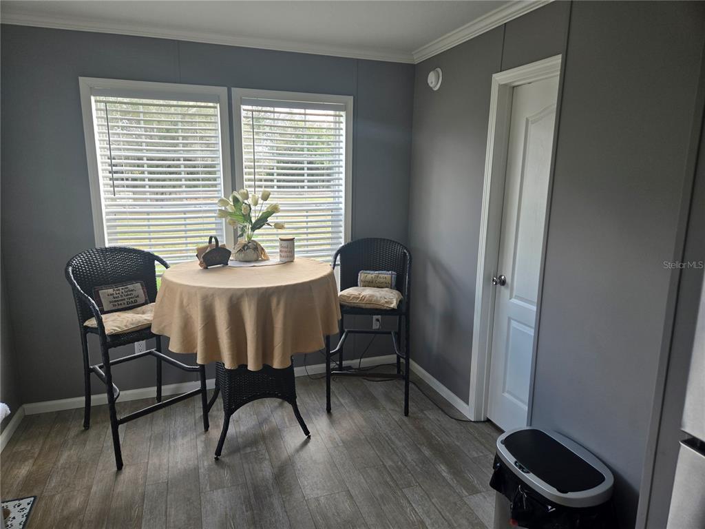 1981 Southeast Piggy Back Road Arcadia, FL 34266 - Photo 8 of 19 a dining room with furniture and a window