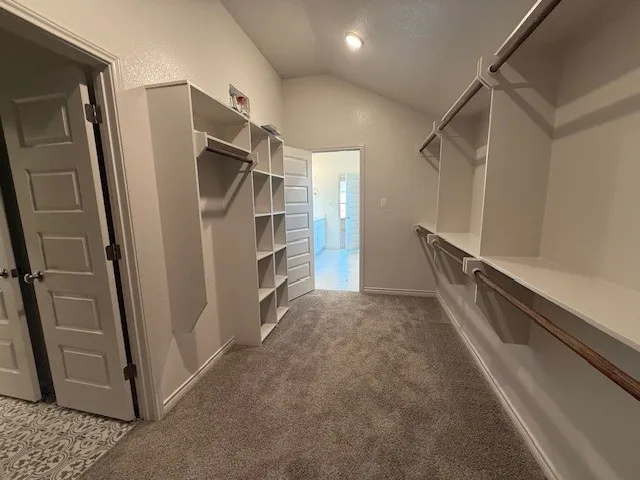 a bathroom with a shower and a tub