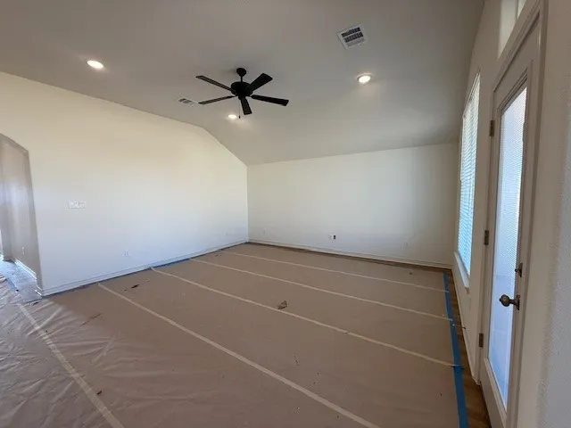 a kitchen with kitchen island a sink stainless steel appliances and cabinets