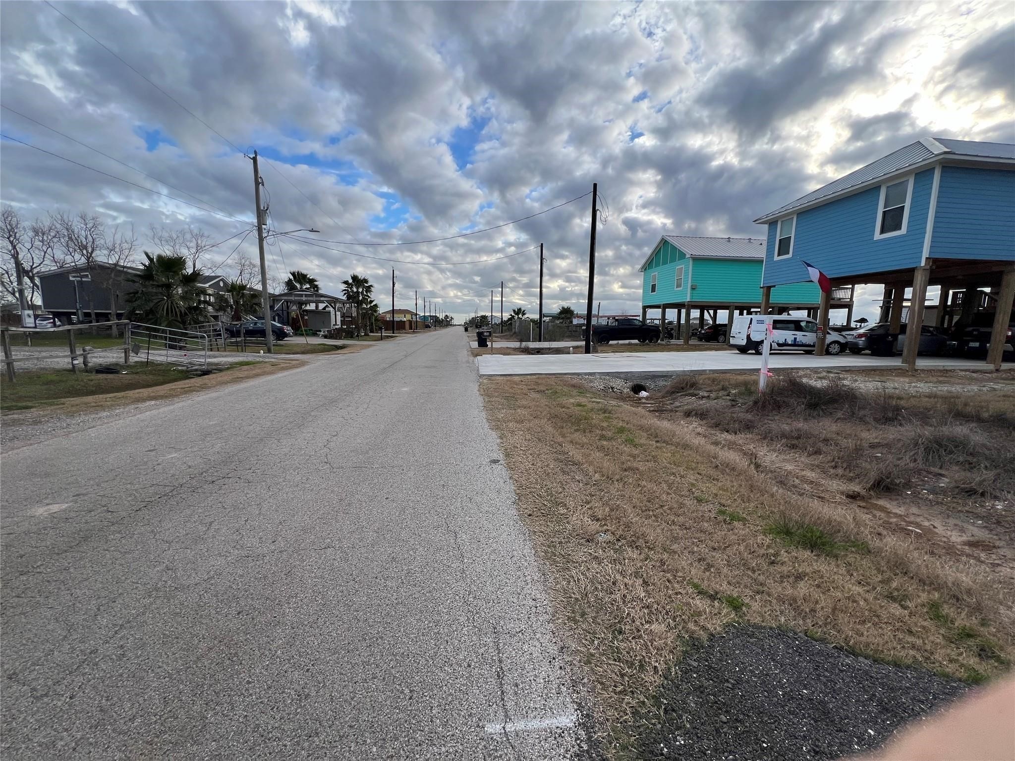 632 18th Street San Leon, TX 77539 - Photo 4 of 10 a view of a street with houses on both side
