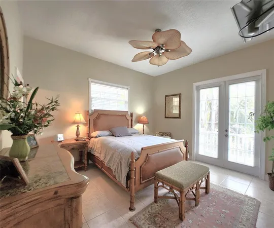 a living room with lots of furniture and view of kitchen