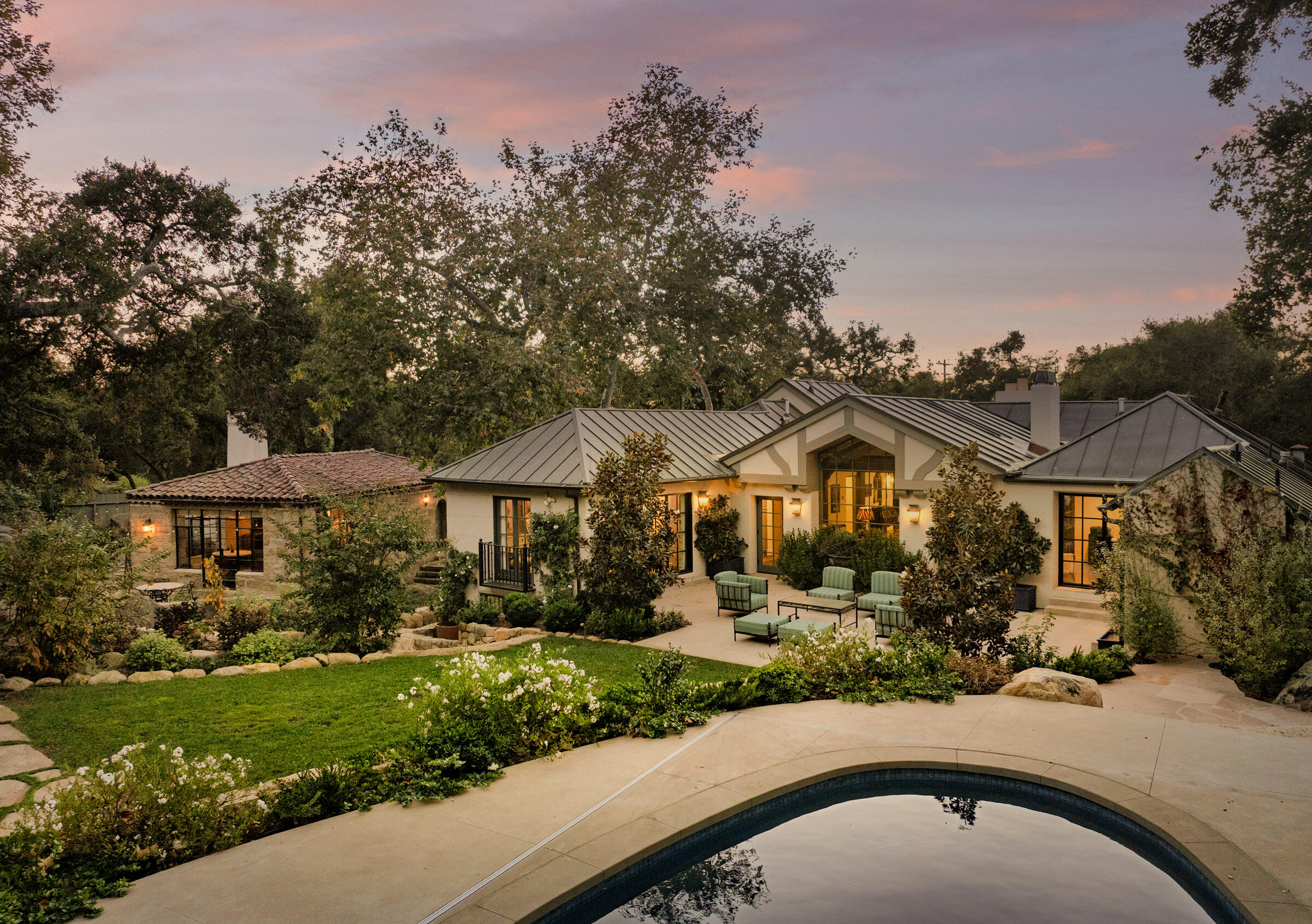 700 Mission Canyon Road Santa Barbara, CA 93105 - Photo 1 of 44 a front view of a house with a yard