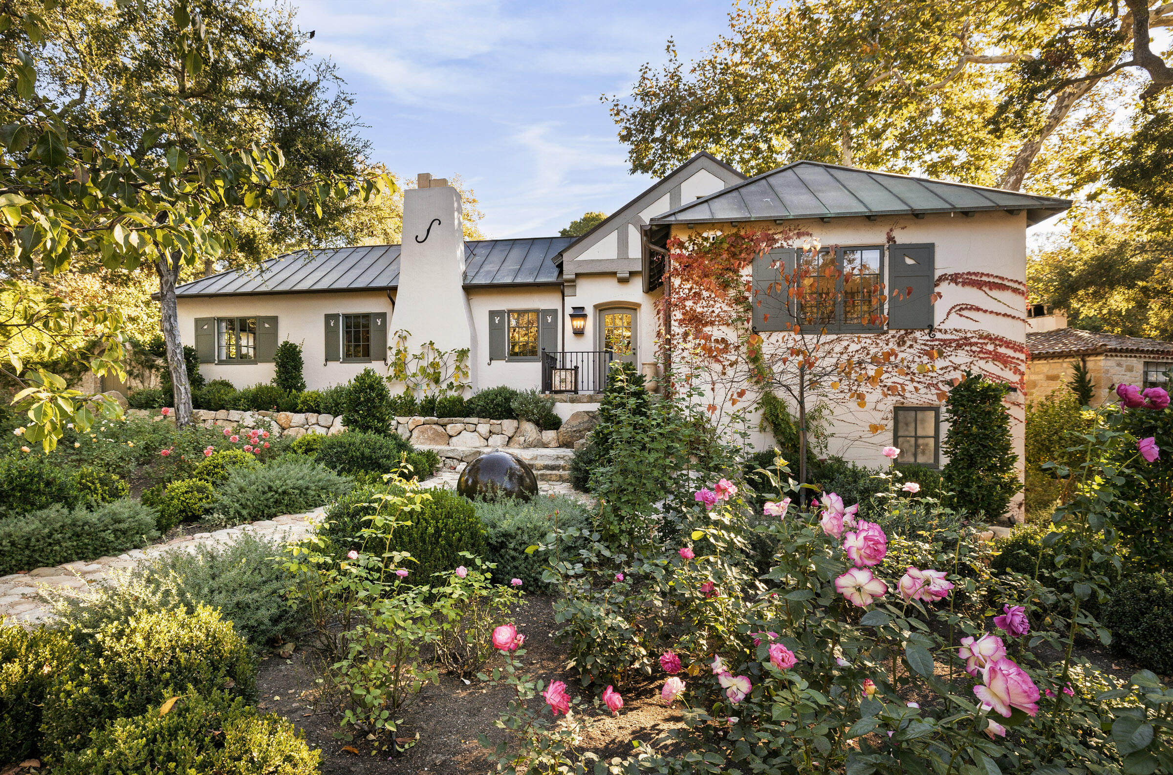 700 Mission Canyon Road Santa Barbara, CA 93105 - Photo 2 of 44 a view of a house with a flower garden