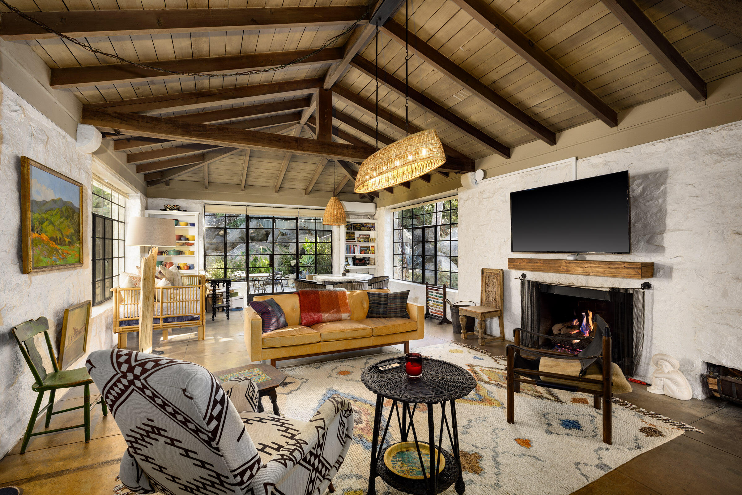 700 Mission Canyon Road Santa Barbara, CA 93105 - Photo 23 of 44 a living room with furniture and a fireplace