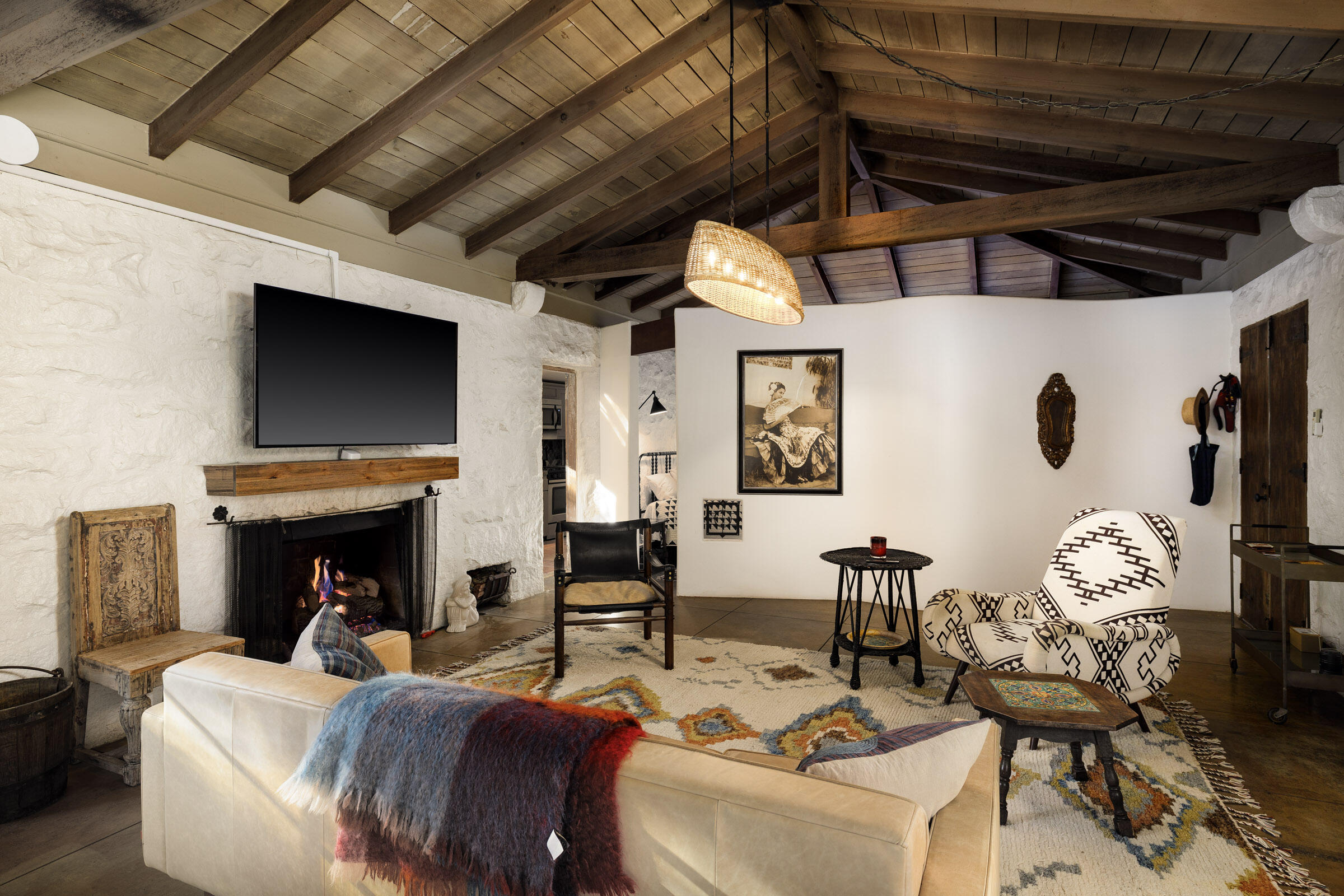 700 Mission Canyon Road Santa Barbara, CA 93105 - Photo 24 of 44 a view of a livingroom with furniture and a fireplace