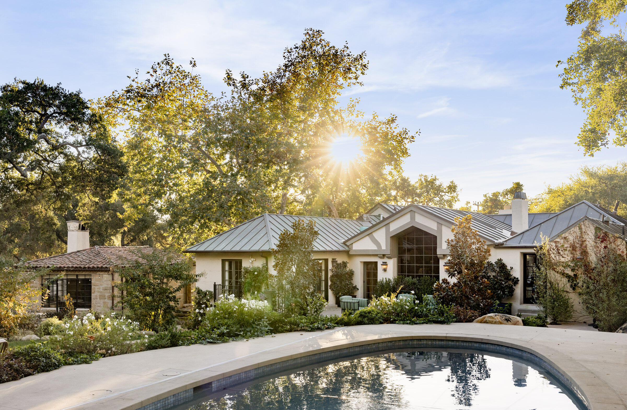 700 Mission Canyon Road Santa Barbara, CA 93105 - Photo 33 of 44 a front view of a house with a yard