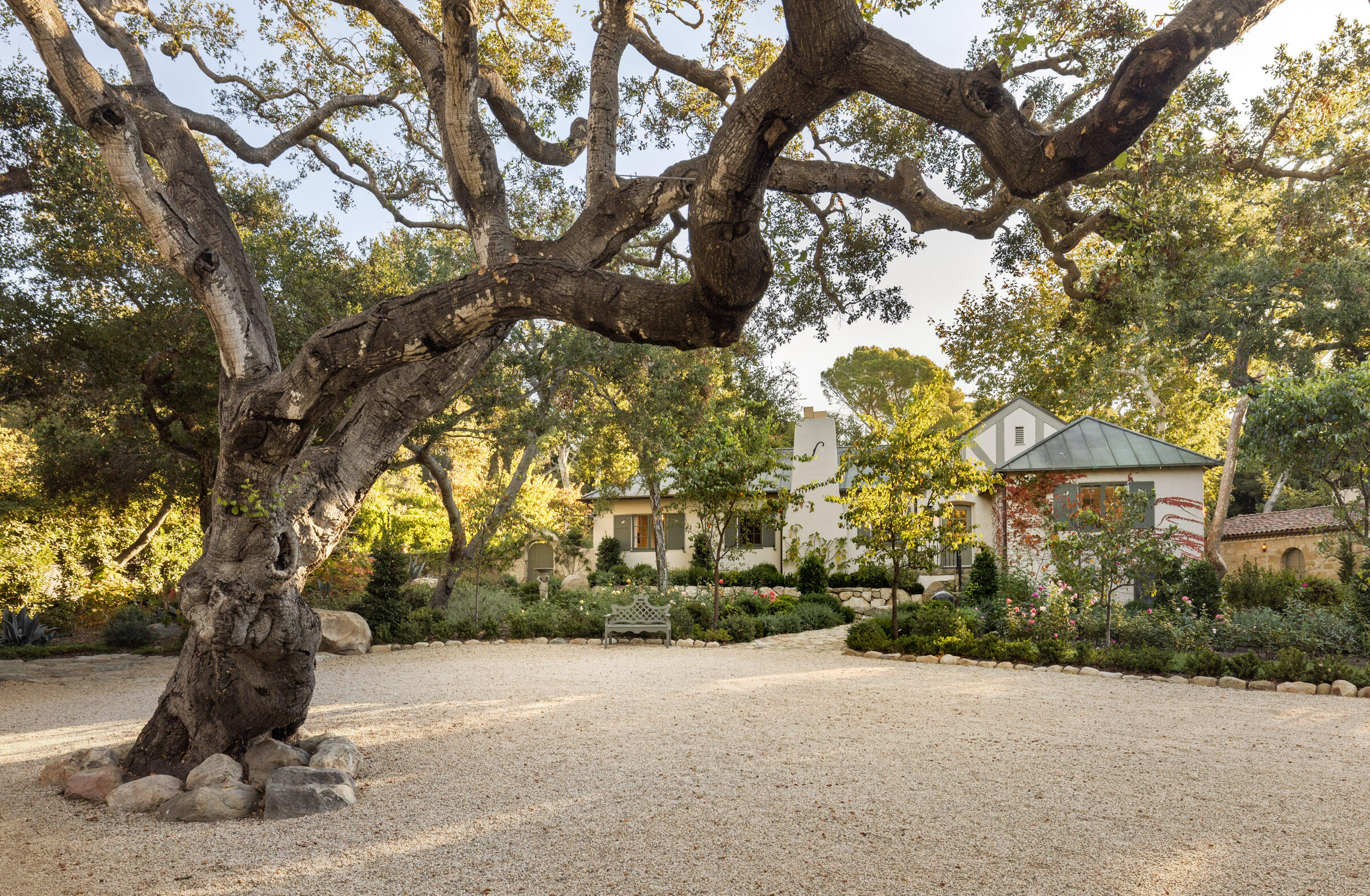 700 Mission Canyon Road Santa Barbara, CA 93105 - Photo 4 of 44 a street view with large trees